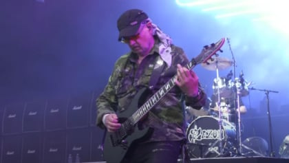 SAXON's Founding Guitarist PAUL QUINN To 'Step Back From Touring'