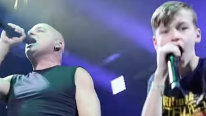 Watch: DISTURBED Joined By 13-Year-Old Fan For 'The Game' Performance In Green Bay
